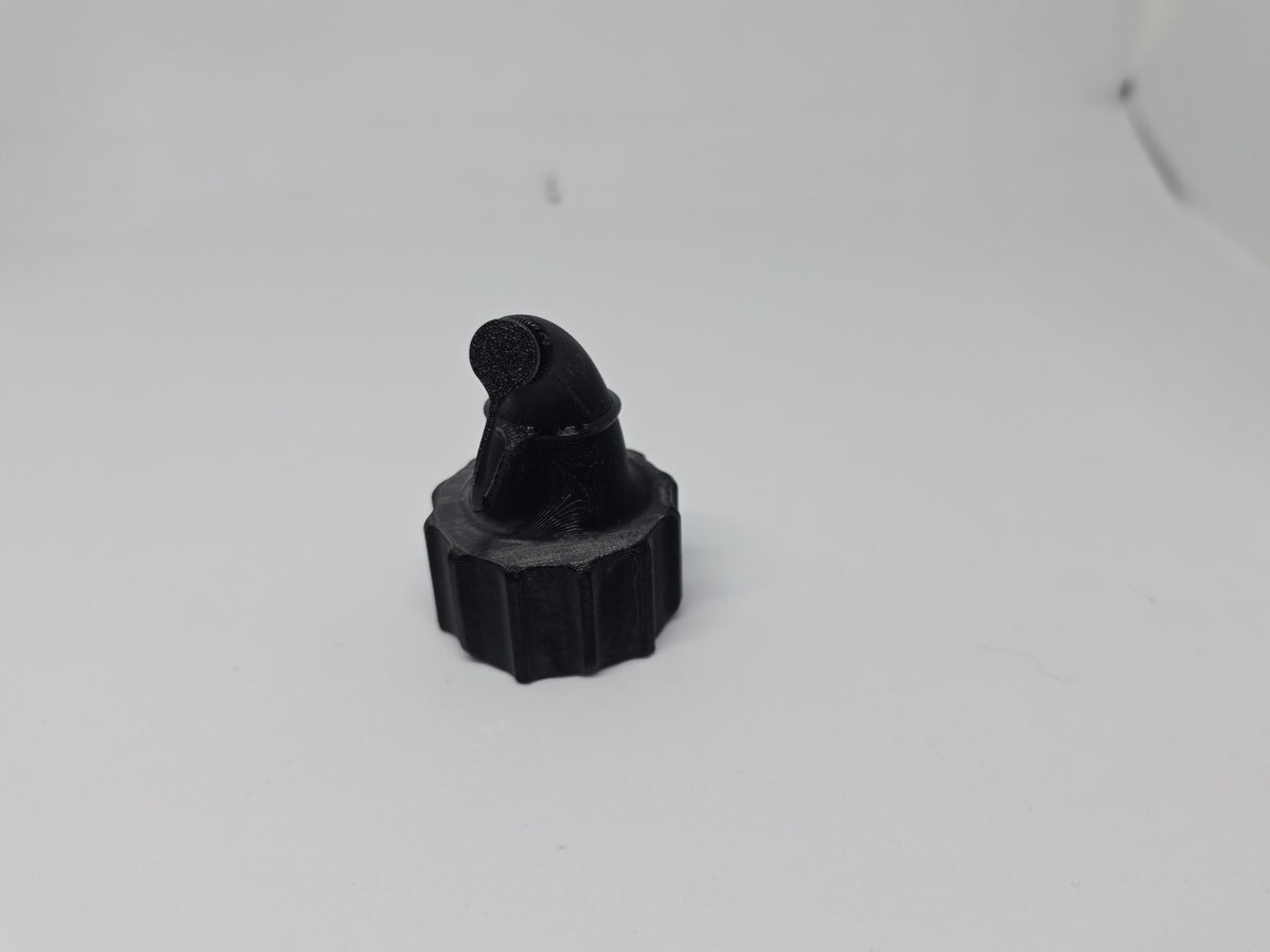 Toilet cleaner nozzle tethered cap