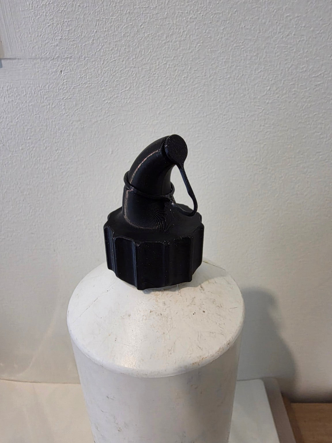 Commercial toilet cleaner nozzle fitted close-up